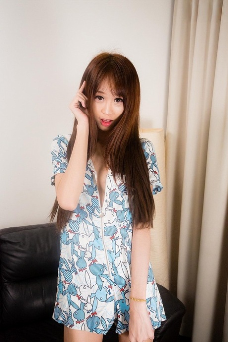 Tall Asian shemale Kita shows her uncut cock & her tight anal love hole