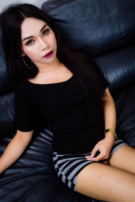 Pretty shemale Chocolat shows off her big balls & her inviting anal love hole